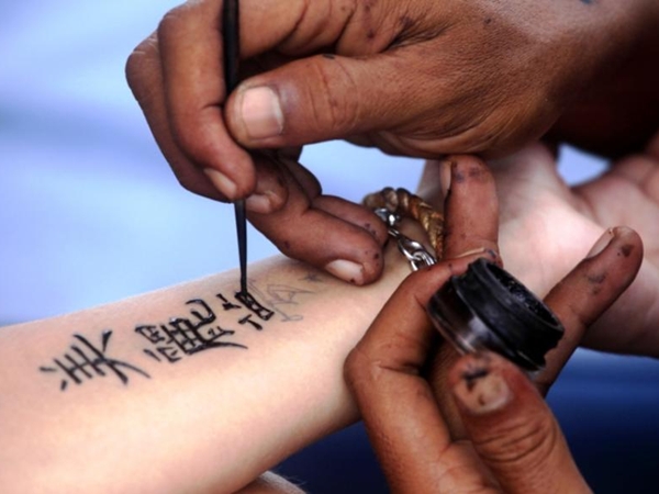 Relaci&oacute;n del c&aacute;ncer y tatuajes