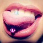 Significado del piercing en la lengua. (tatuajex.com) Todos los derechos reservados.