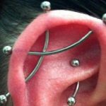 Piercing para los cartílagos de la oreja. (tatuajex.com) Todos los derechos reservados.